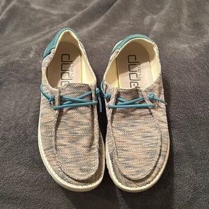 Pinks and turquoise multi colored, turquoise back and laces.